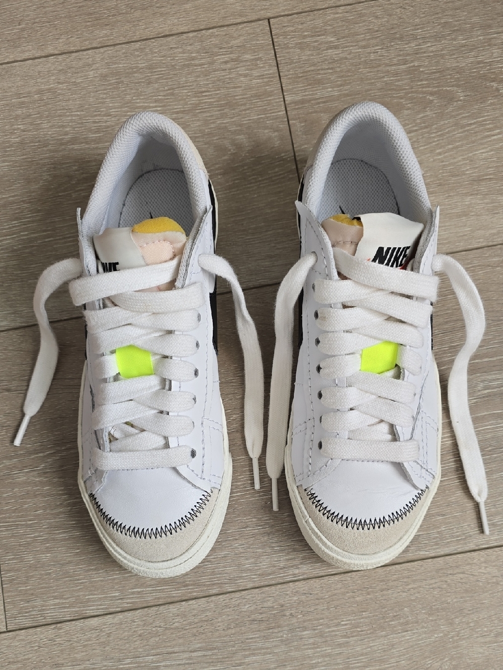 Nike Blazer Low '77 Jumbo sneakers featuring a black oversized Swoosh and thick